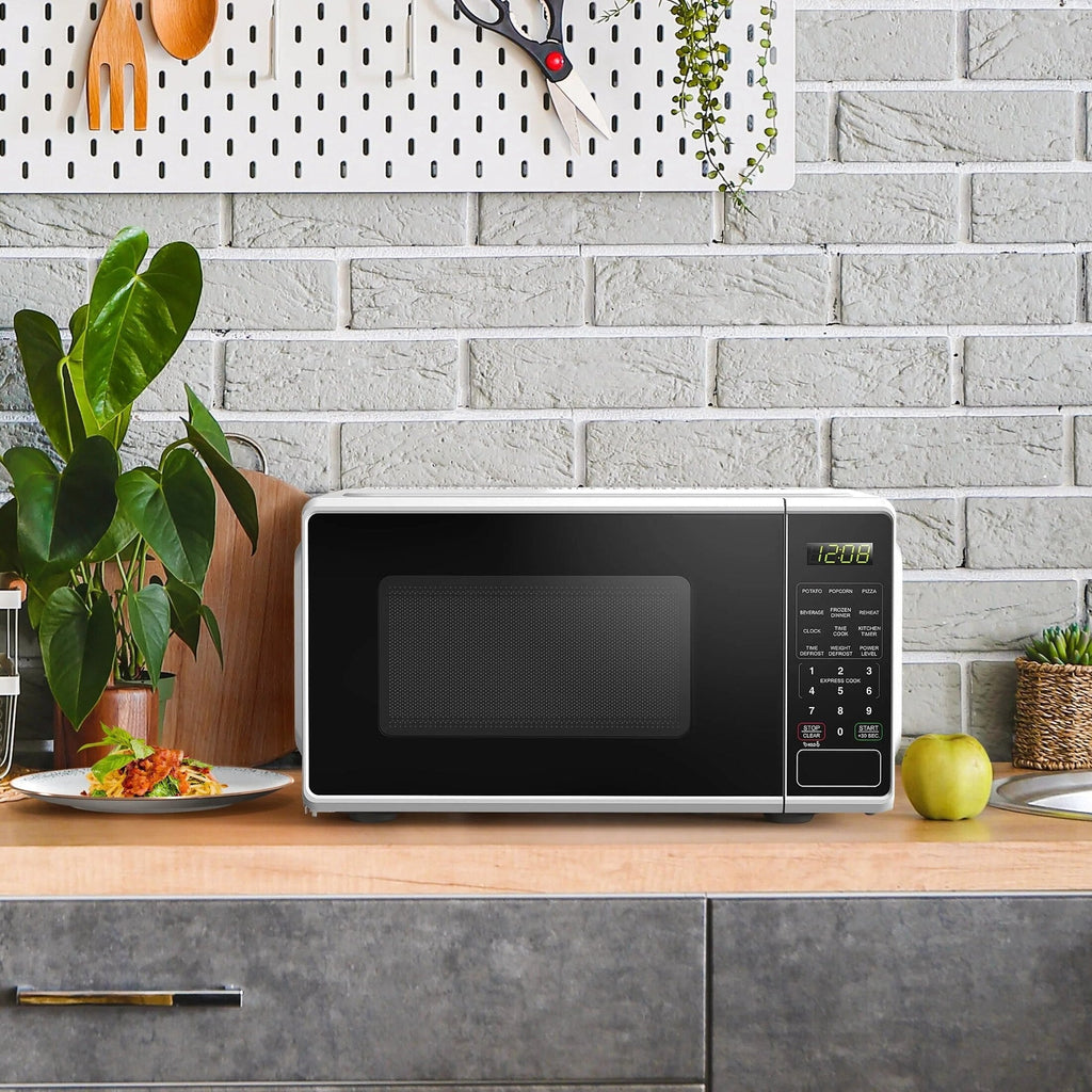 Mainstays Countertop Microwave Oven 0.7 Cu Ft 700 Watts White - MSF0W100072352