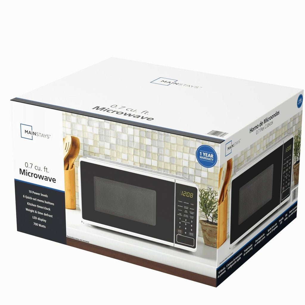 Mainstays Countertop Microwave Oven 0.7 Cu Ft 700 Watts White - MSF0W100072352